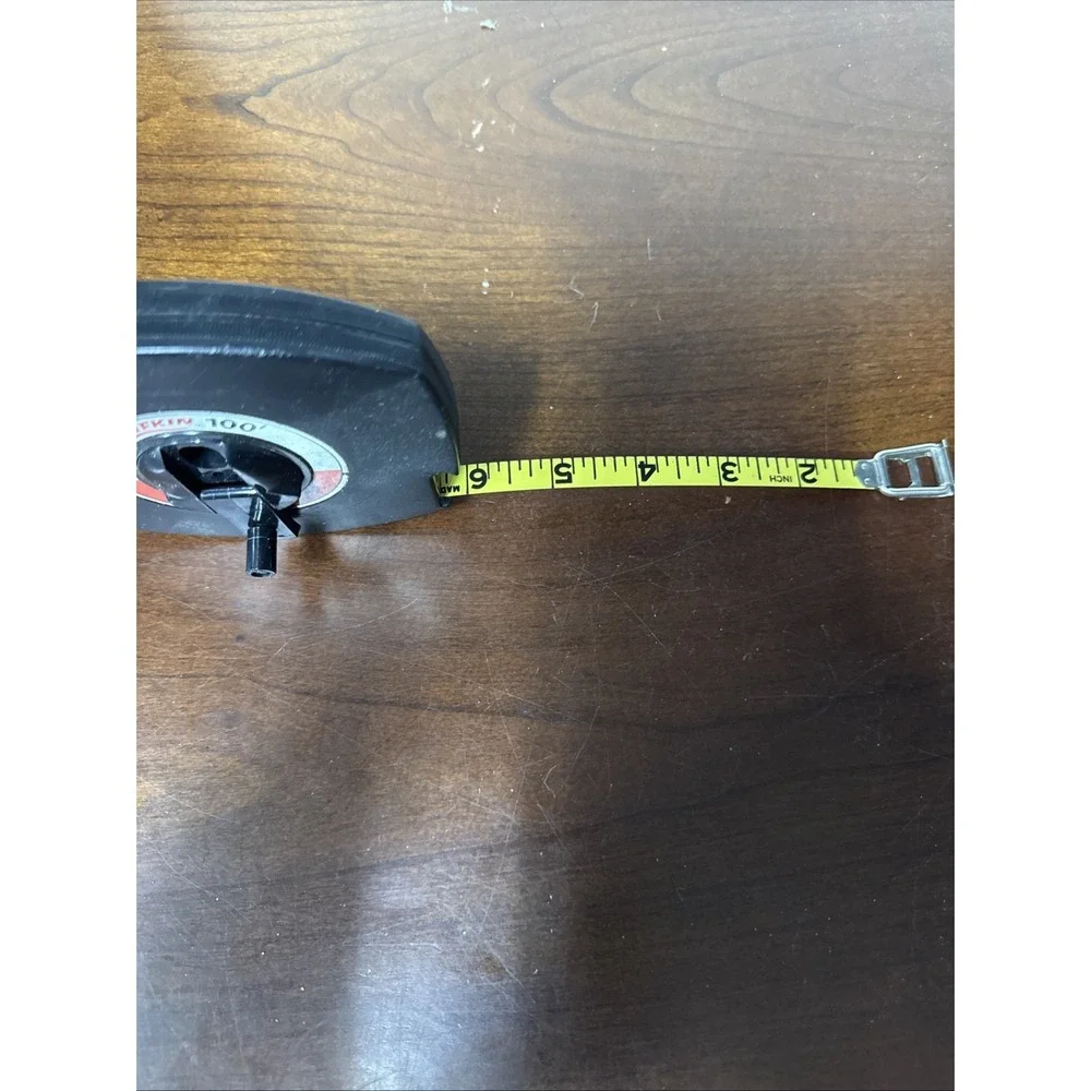Vintage Lufkin Tape Measure.‎ And 100ft. Yellow Clad 100